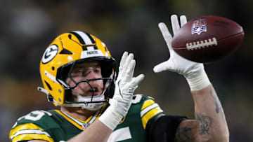 Nov 28, 2024; Green Bay, Wisconsin, USA; Green Bay Packers tight end Tucker Kraft (85) makes a catch against the Miami Dolphins  at Lambeau Field. Mandatory Credit: Wm. Glasheen-Imagn Images