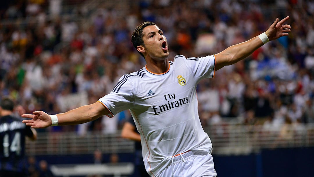 Aug 10, 2013; St. Louis, MO, USA; Real Madrid forward Cristiano Ronaldo (7) celebrates his goal against Inter Milan. Real Madrid defeated Inter Milan 3-0. Mandatory Credit: Scott Rovak-Imagn Images
