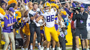 LSU tight end Mason Taylor celebrates after scoring the game-winning two point conversion in overtime against Alabama at Tiger Stadium.

2022-11-06-lsu-mason-taylor