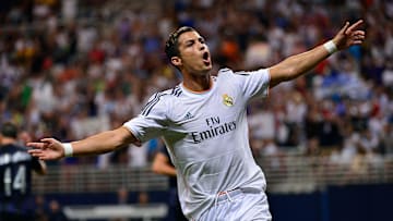Aug 10, 2013; St. Louis, MO, USA; Real Madrid forward Cristiano Ronaldo (7) celebrates his goal against Inter Milan. Real Madrid defeated Inter Milan 3-0. Mandatory Credit: Scott Rovak-Imagn Images