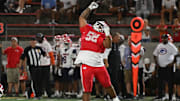 Mater Dei junior defensive lineman Tomuhini Topui celebrates a big play against Bishop Gorman on Friday, Sept. 6, 2024.