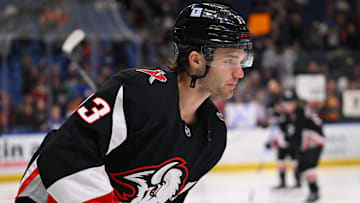 Josh Norris (13) during the pregame skate. 