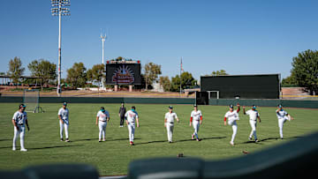 Players warm up for batting practice at Arizona Fall League media day at Scottsdale Stadium during media day on Oct. 4, 2024, in Scottsdale, Arizona.