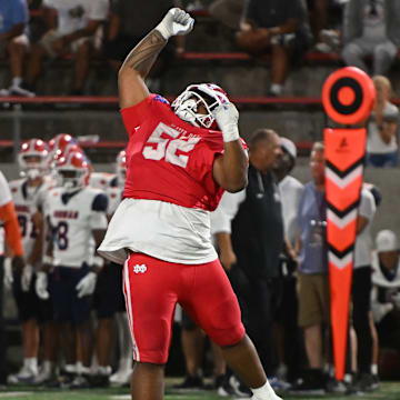 Mater Dei junior defensive lineman Tomuhini Topui celebrates a big play against Bishop Gorman on Friday, Sept. 6, 2024.