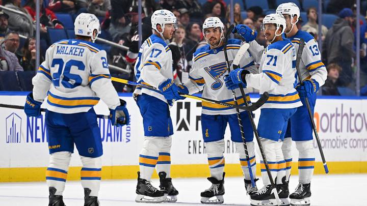 The 4th line celebrating a goal from defenseman Justin Faulk