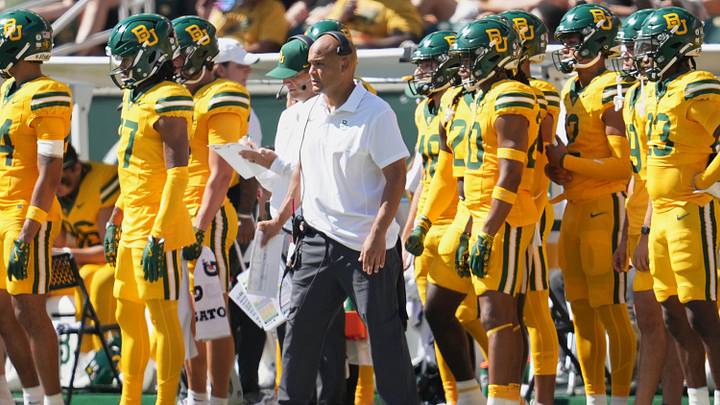 Oct 4, 2025; Waco, Texas, USA; Baylor Bears head coach Dave Aranda watches game play from the sideline against the Kansas State Wildcats during the first half at McLane Stadium. Mandatory Credit: Chris Jones-Imagn Images