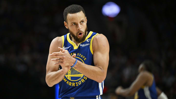 Golden State Warriors guard Stephen Curry (30) claps his hands in celebration during the second half against the Portland Trail Blazers at Moda Center. Mandatory Credit: Troy Wayrynen-USA TODAY Sports