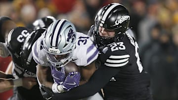 Iowa State Cyclones linebacker Will McLaughlin (23) takes down Kansas State Wildcats running back DJ Giddens (31) during the first quarter in the NCAA football at Jack Trice Stadium on Saturday, Nov. 30, 2024, in Ames, Iowa.
