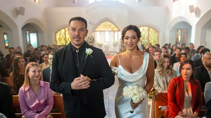 “I Do” – Gabriela prepares to walk down the aisle on her wedding day as Bode receives some surprising news, on the second season finale of FIRE COUNTRY, Friday, May 17 (9:00-10:00 PM, ET/PT) on the CBS Television Network, and streaming on Paramount+ Pictured: Kevin Alejandro as Manny Perez and Stephanie Arcila as Gabriela Perez. Photo: Sergei Bachlakov/CBS ©2024 CBS Broadcasting, Inc. All Rights Reserved.