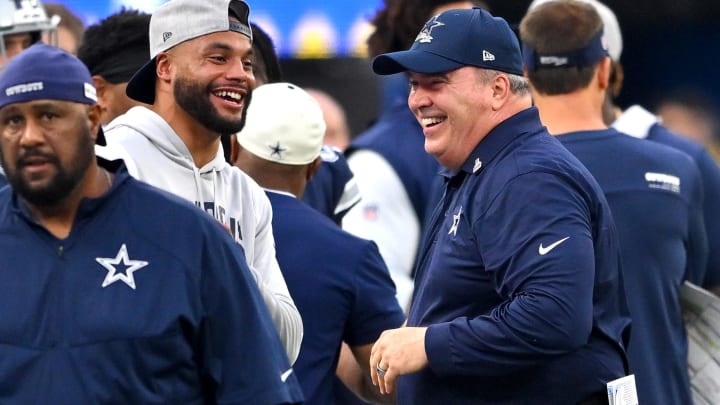 Inglewood, California, USA; Dallas Cowboys head coach Mike McCarthy celebrates with quarterback Dak Prescott (4) after defeating the Los Angeles Rams at SoFi Stadium. 