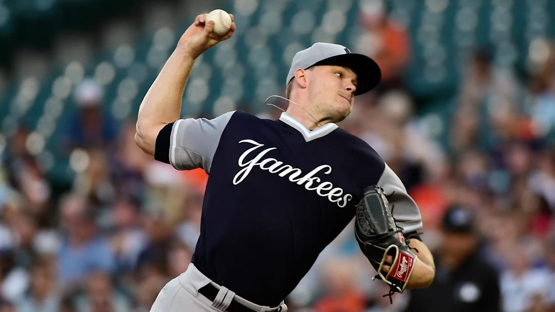 Aug 25, 2018; Baltimore, MD, USA; New York Yankees starting pitcher Sonny Gray (55) pitches during the first inning against the Baltimore Orioles at Oriole Park at Camden Yards. Mandatory Credit: Tommy Gilligan-Imagn Images