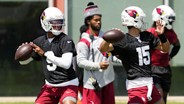 Arizona Cardinals Kyler Murray watches quarterbacks Joshua Dobbs (9) and Clayton Tune (15) during