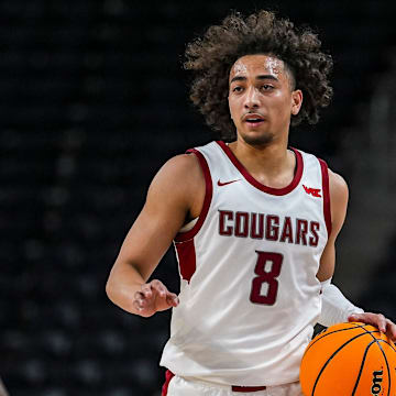 Washington State Cougars guard Nate Calmese (8) takes the ball down the court during the first half of their game in the Acrisure Series in Palm Desert, Calif., Wednesday, Nov. 27, 2024.
