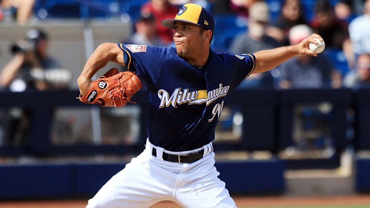 Milwaukee Brewers minor league pitcher Clayton Andrews delivers a pitch during their spring training