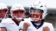 Liberty quarterback Kaidon Salter (7) celebrates his touchdown against Middle Tennessee during the Salute to Veterans & Armed Forces game at MTSU on Saturday, Nov. 9, 2024.