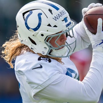 Indianapolis Colts tight end Tyler Warren (84) catches a pass Friday, July 25, 2025, during training camp held at Grand Park in Westfield.