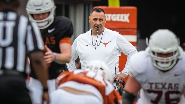 Texas Longhorns Head Coach Steve Sarkisian watches from behind the play during the first quarter of