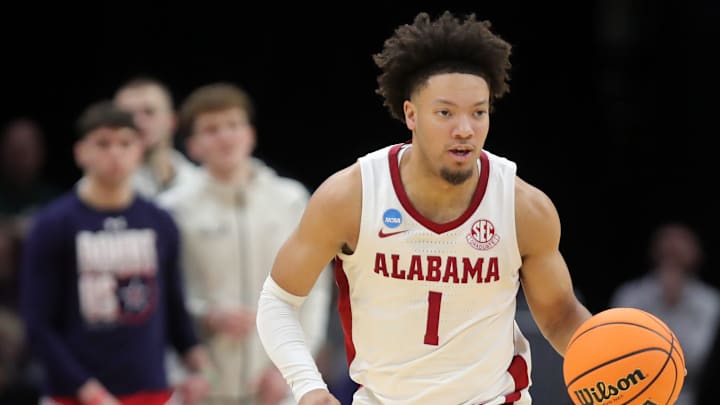 Alabama Crimson Tide guard Mark Sears (1) takes the ball up the court during the second half of an NCAA Tournament First Round game against the Robert Morris Colonials at Rocket Arena on Friday, March 21, 2025, in Cleveland, Ohio.