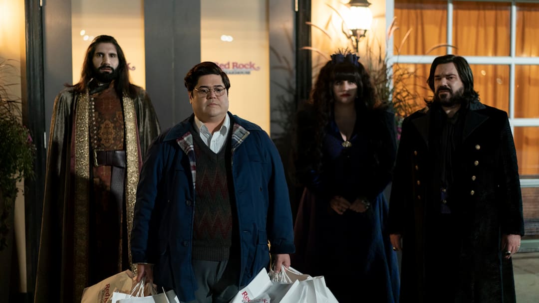 “WHAT WE DO IN THE SHADOWS” -- “The Mall” -- Season 5, Episode 1 (Airs July 13) — Pictured (L-R): Kayvan Novak as Nandor, Harvey Guillén as Guillermo, Natasia Demetriou as Nadja, , Matt Berry as Laszlo. CR: Russ Martin: FX