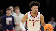 Alabama Crimson Tide guard Mark Sears (1) takes the ball up the court during the second half of an NCAA Tournament First Round game against the Robert Morris Colonials at Rocket Arena on Friday, March 21, 2025, in Cleveland, Ohio.