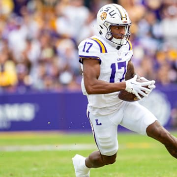 Chris Hilton Jr 17 runs the ball as the LSU Tigers take on Texas A&M in Tiger Stadium in Baton Rouge, Louisiana, November 25, 2023.