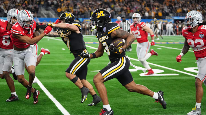 Dec 29, 2023; Arlington, Texas, USA; Missouri Tigers wide receiver Luther Burden III (3) runs upfield during the fourth quarter of the Goodyear Cotton Bowl Classic against the Ohio State Buckeyes at AT&T Stadium.