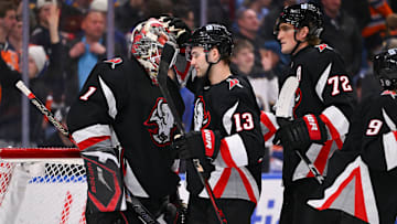Buffalo Sabres players Ukko-Pekka Luukkonen, Josh Norris and Tage Thompson