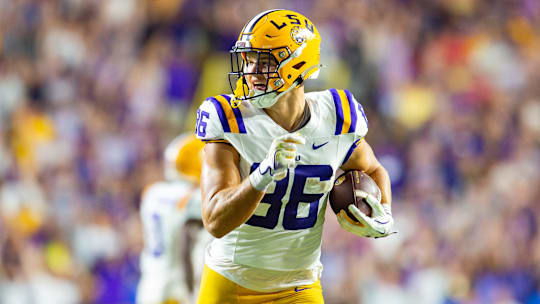 Mason Taylor 86 runs the ball as the LSU Tigers take on the Ole Miss Rebels at Tiger Stadium in Baton Rouge, LA. Saturday, Oct. 12, 2024.Saturday, Oct. 12, 2024.