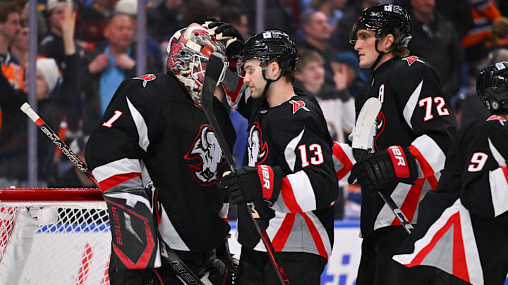Buffalo Sabres players Ukko-Pekka Luukkonen, Josh Norris and Tage Thompson