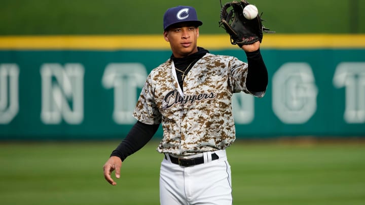 Apr 3, 2024; Columbus, OH, USA; Columbus Clippers third baseman Juan Brito (24) warms up prior to the Opening Day game against the Omaha Storm Chasers at Huntington Park.