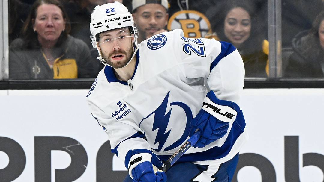 Mar 15, 2025; Boston, Massachusetts, USA; Tampa Bay Lightning right wing Oliver Bjorkstrand (22) skates with the puck during the second period against the Boston Bruins at TD Garden.