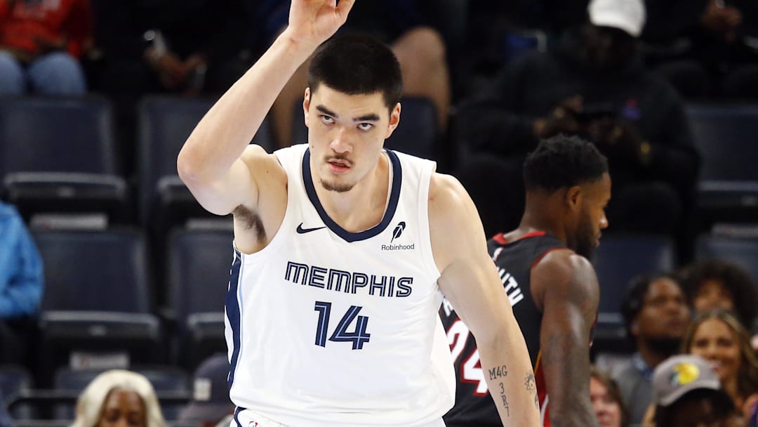 Oct 18, 2024; Memphis, Tennessee, USA; Memphis Grizzlies center Zach Edey (14) react after a dunk during the first half against the Miami Heat at FedExForum. Mandatory Credit: Petre Thomas-Imagn Images
Oct 18, 2024; Memphis, Tennessee, USA; Memphis Grizzlies center Zach Edey (14) react after a dunk during the first half against the Miami Heat at FedExForum. Mandatory Credit: Petre Thomas-Imagn Images