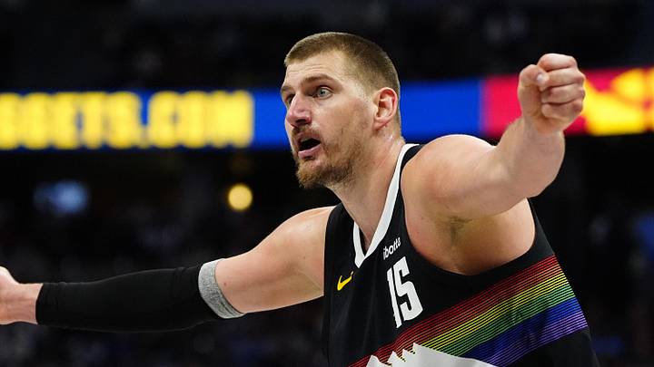 Apr 4, 2026; Denver, Colorado, USA; Denver Nuggets center Nikola Jokic (15) reacts towards a referee against the San Antonio Spurs at Ball Arena. Mandatory Credit: Ron Chenoy-Imagn Images