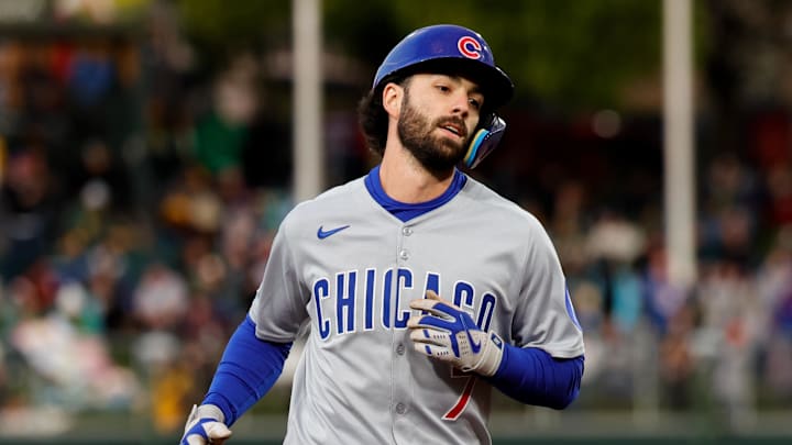 Chicago Cubs shortstop Dansby Swanson runs the bases after hitting a home run.