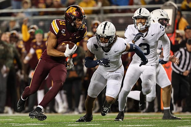 Minnesota Golden Gophers wide receiver Elijah Spencer (11) runs after a catch against the Penn State Nittany Lions.