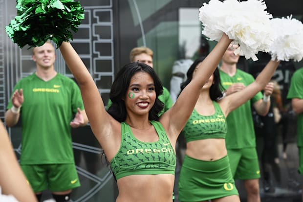 Oregon Ducks schedule football oklahoma state autzen stadium color wear fans dan lanning cheerleader big ten upset watch tv 