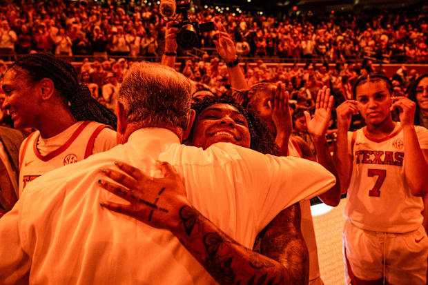 Rori Harmon hugs Vic Schaefer after beating South Carolina