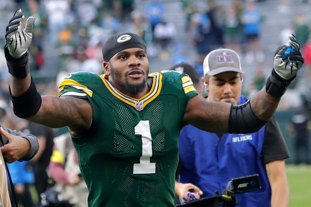 Micah Parsons walks off the field after his first game with the Packers