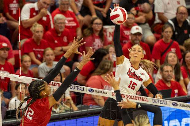 Nebraska middle blocker Andi Jackson fires a kill during the Red-White Scrimmage on Saturday.