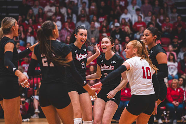 Nebraska players celebrate a point at Indiana.