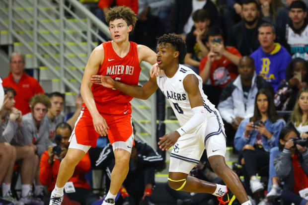 Bronny James battles Mater Dei's Devin Askew for space during his freshman season of 2019-2020.