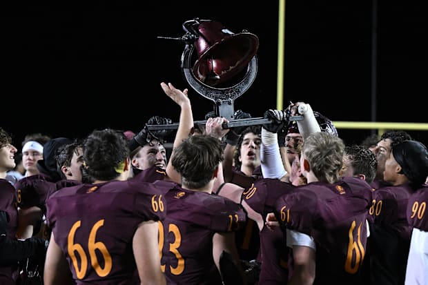 Walsh Jesuit players celebrate a win over St. Vincent-St. Mary.
