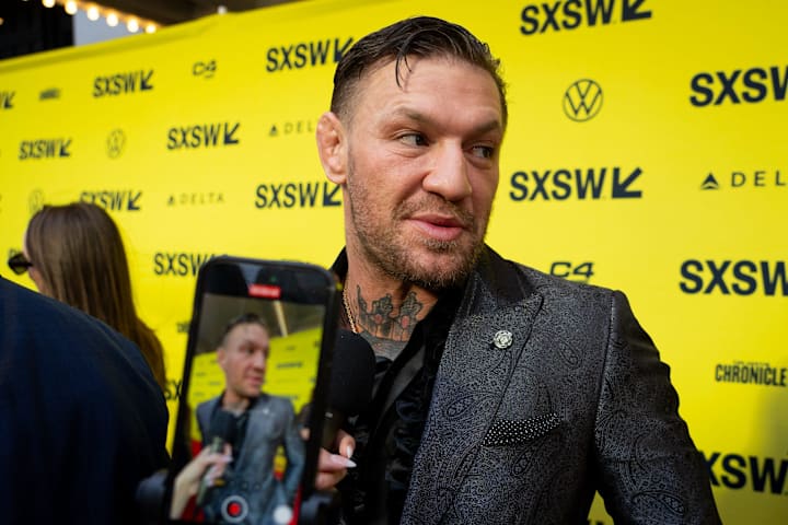 Conor McGregor speaks to press on the red carpet before the premiere of Road House at SXSW. 