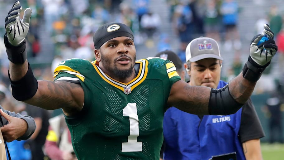 Micah Parsons walks off the field after his first game with the Packers