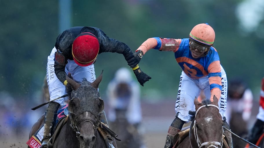 Golden Tempo, with José Ortiz up, left, is congratulated by his brother, Irad, aboard Renegade.