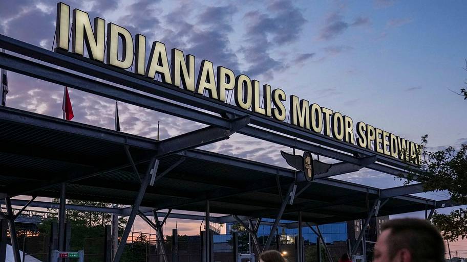 Racing fans walk through the entrance ahead of the 109th running of the Indianapolis 500 at Indianapolis Motor Speedway.