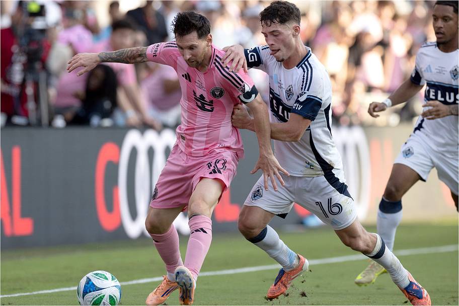 Sebastian Berhalter battles with Lionel Messi.