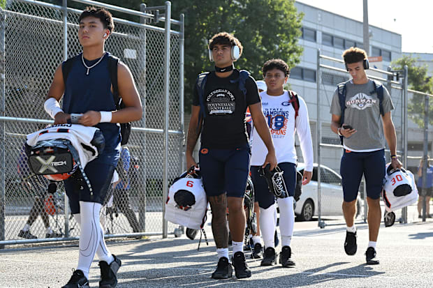 Bishop Gorman football players arrive at the Santa Ana Bowl before their showdown with Mater Dei on Friday, Sept. 6, 2024.