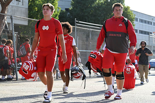 Mater Dei football players arrive at the Santa Ana Bowl before their showdown with Bishop Gorman on Friday, Sept. 6, 2024.