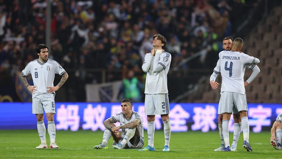 Dejected Italy players after losing to Bosnia and Herzegovina